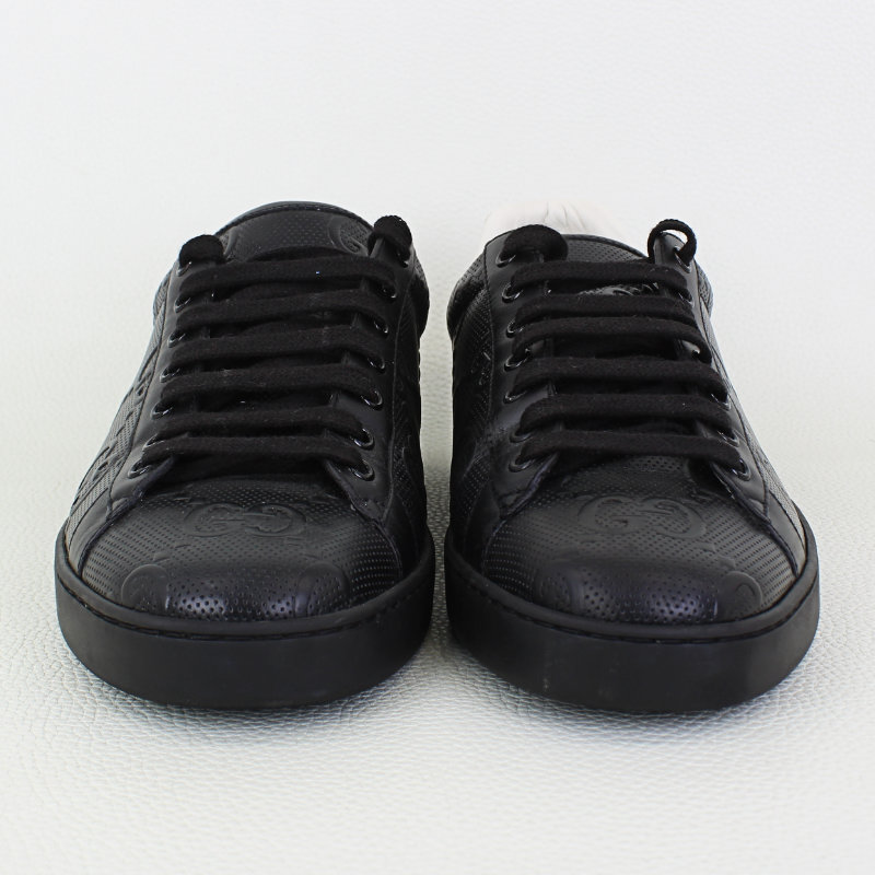 Men's Ace GG embossed sneaker in black leather