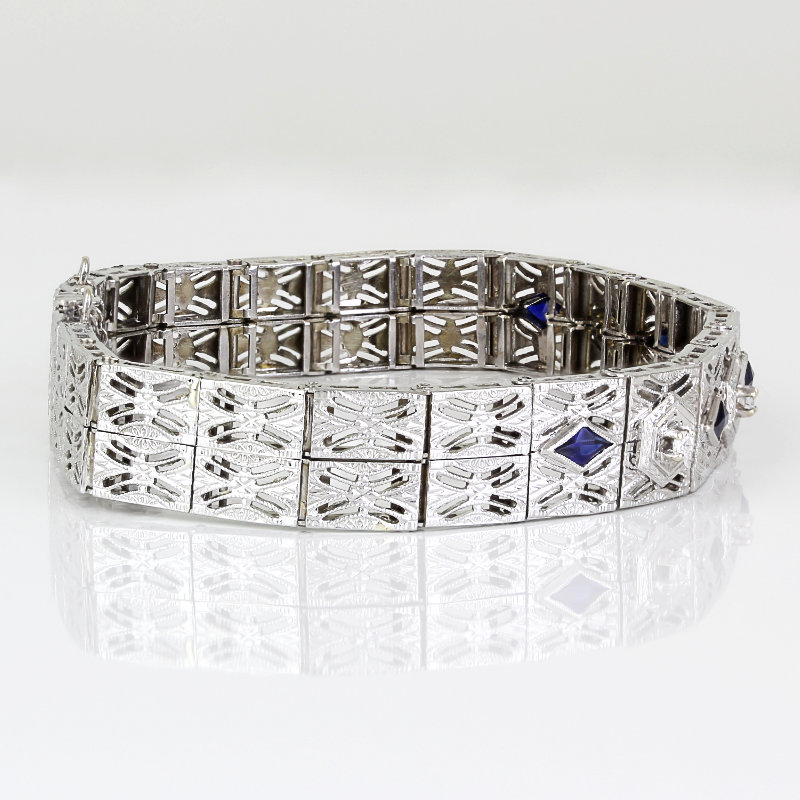 L'Arc Voyage Charm PM, 18K White Gold with Galerie Diamonds on Silk Cord Bracelet Caraïbes