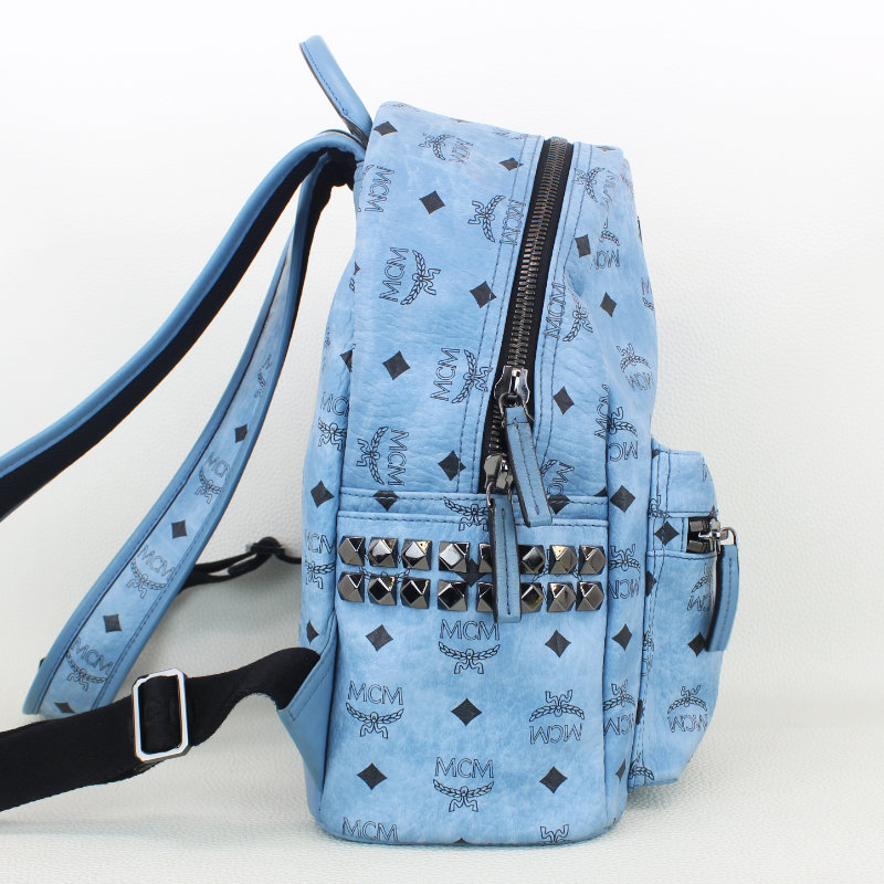 Blue mcm backpack hot sale with studs